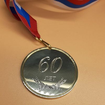 Гравировка на эксклюзивной медали из латуни
